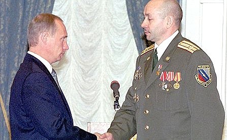 Alexei Makhotin, an internal service colonel who fought in Chechnya, being given the title of Hero of Russia at a state award ceremony.