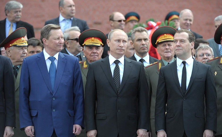 Vladimir Putin laid a wreath at the Tomb of the Unknown Soldier by the Kremlin wall on the Day of Memory and Grief. With Chief of Staff of the Presidential Executive Office Sergei Ivanov (left) and Prime Minister Dmitry Medvedev.