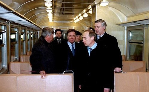 Vladimir Putin in a car of a new electric train built by the Demikhovsky engineering plant.
