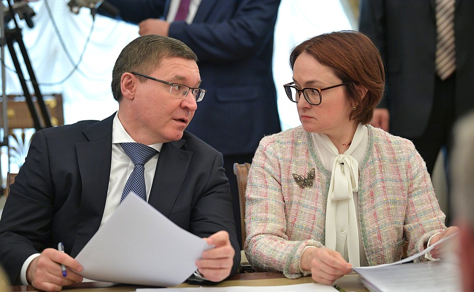 Minister of Construction, Housing and Utilities Vladimir Yakushev and Governor of the Central Bank of Russia Elvira Nabiullina before a meeting with Government members.