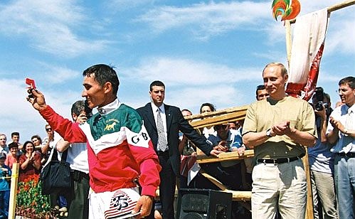 Sabantui, a Tatar festival. President Putin giving a prize to the winner of a horse race.