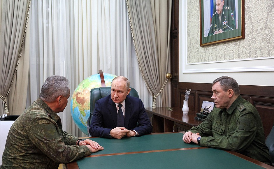At the headquarters of the Southern Military District. With Defence Minister Sergei Shoigu (left) and Chief of the General Staff of Russia's Armed Forces Valery Gerasimov.