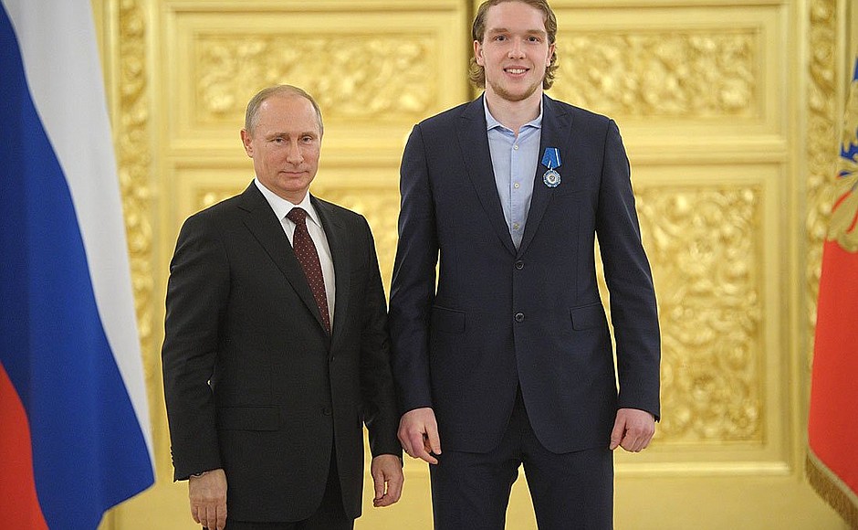 With goaltender of the Russian national ice hockey team Andrei Vasilevsky.