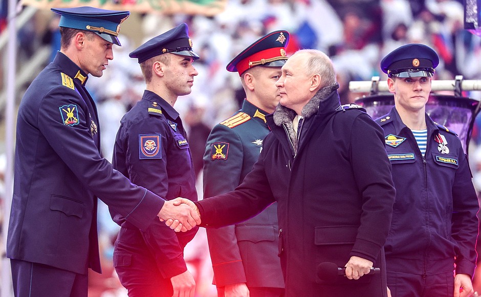 With military personnel of the Russian Federation Armed Forces participating in the special military operation at the Glory to Defenders of the Fatherland rally-concert.