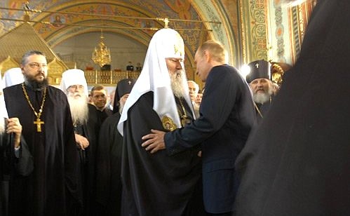 President Putin with Patriarch Alexii II of Moscow and All Russia in the Church of St Seraphim of Sarov.