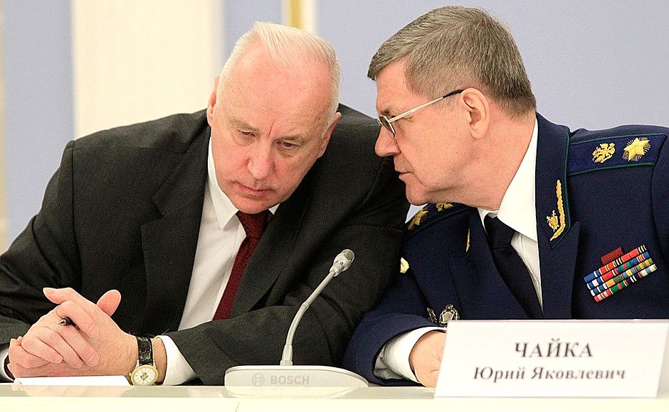 Before the start of a meeting on improving legislation and on law application practices. Chairman of the Investigative Committee Alexander Bastrykin (left) and Prosecutor General Yury Chaika.