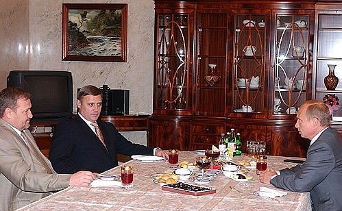 President Putin meeting with President of the Chechen Republic Akhmat Kadyrov and Russian Prime Minister Mikhail Kasyanov.
