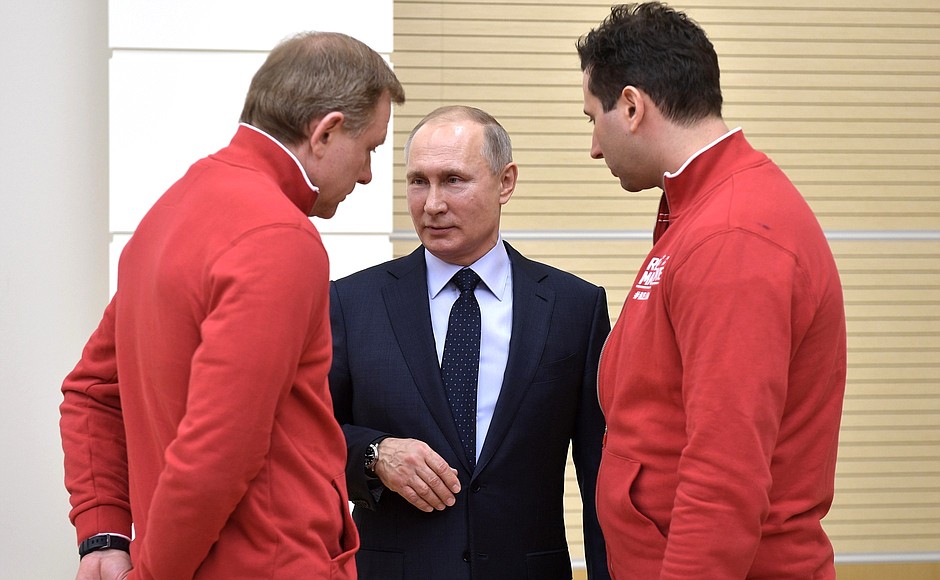 At a meeting with Russian athletes to compete in 23rd Olympic Winter Games in PyeongChang. With Roman Rotenberg, First Vice President of the Russian Ice Hockey Federation (right).