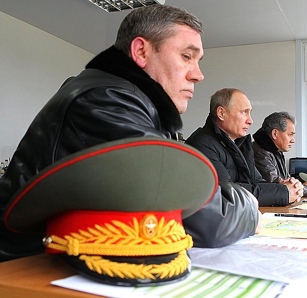 Vladimir Putin observes military exercises in the Black Sea region. With Chief of the General Staff of the Russian Armed Forces Valery Gerasimov (left) and Defence Minister Sergei Shoigu (far right).