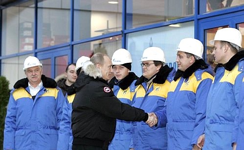 With construction workers who built the Krasnaya Polyana ski resort.