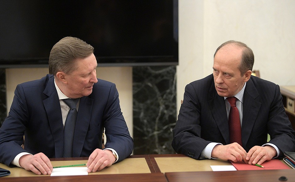 Before the meeting with permanent members of the Security Council. Special Presidential Representative for Environmental Protection, Ecology and Transport Sergei Ivanov (left) and Director of the Federal Security Service Alexander Bortnikov.