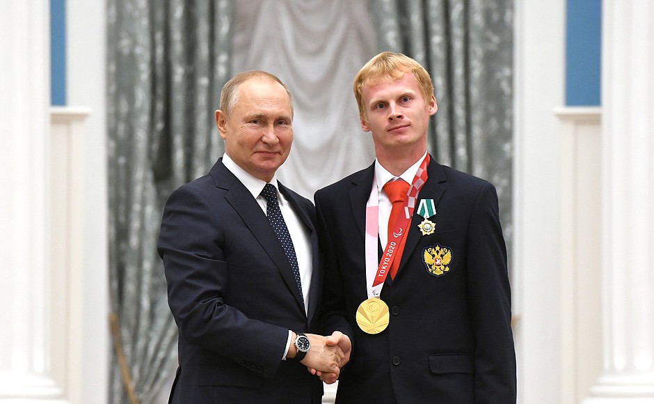 Presenting state decorations to winners of the 2020 Summer Paralympic Games in Tokyo. Paralympic athletics champion Yevgeny Torsunov receives the Order of Friendship.