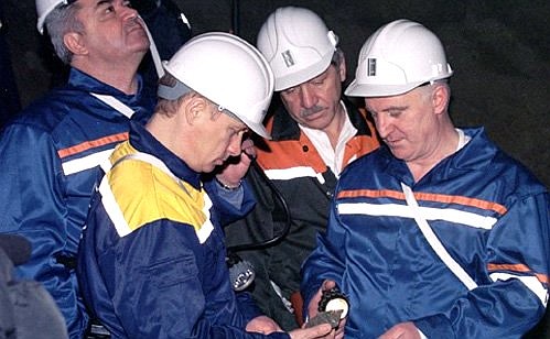President Putin with mine director Batraz Kubalov (right) visiting operations one kilometre below ground at Oktyabrsky Mine.