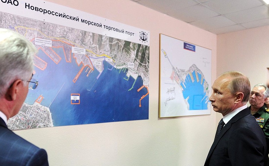 During his visit to the Military Harbour base, Vladimir Putin studies information stands on developing the Azov-Black Sea port infrastructure.