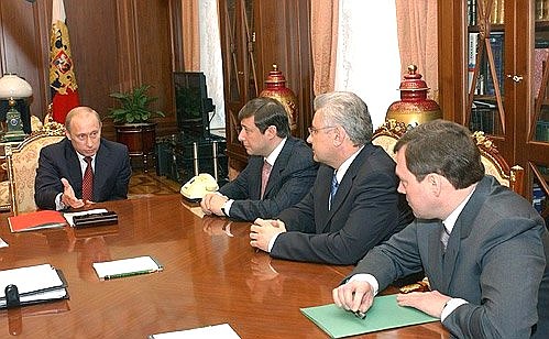 At a meeting with the leaders of Krasnoyarsk Region and the Evenk and Taimyr Autonomous Districts Alexander Khloponin, Boris Zolotaryov and Oleg Budargin.