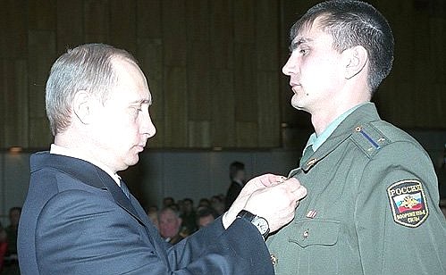 President Putin presenting the Star of the Hero of Russia to Lieutenant Anatoly Korobenkov of the Russian Army\'s special forces.