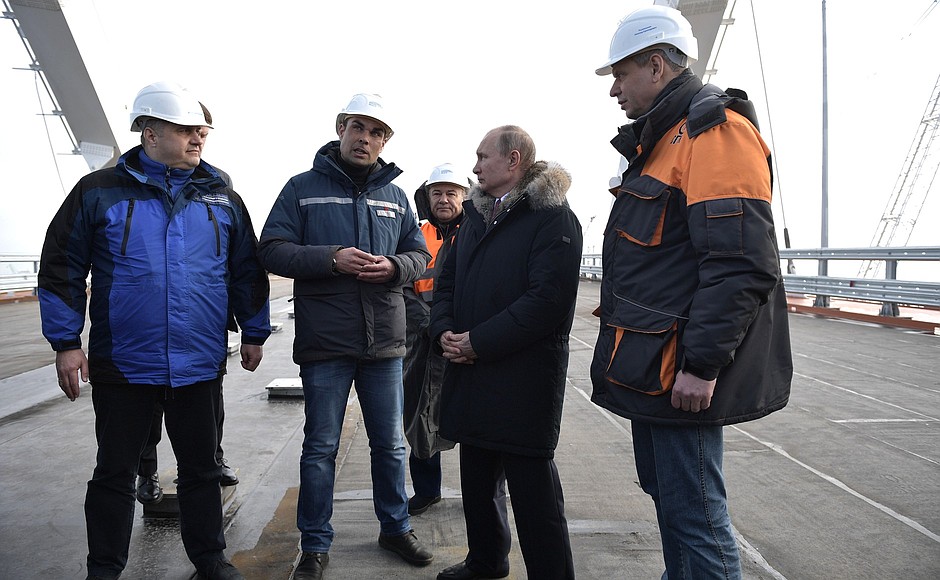 During the inspection of the completed road section of the Crimean Bridge.