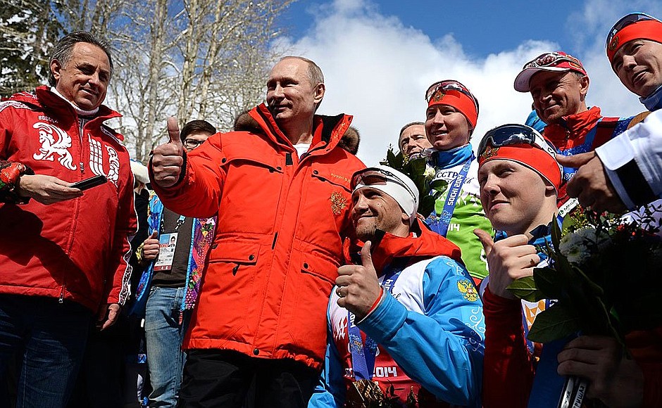 With Sports Minister Vitaly Mutko and Russian athletes Roman Petushkov, Vladislav Lekomtsev, Grigory Murygin and Rushan Minnegulov (left to right) who won gold medals in the open relay event at the Sochi Paralympics.