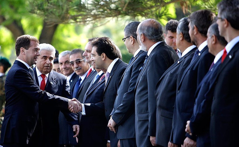 With President of the Republic of Cyprus Demetris Christofias during the official welcoming ceremony.