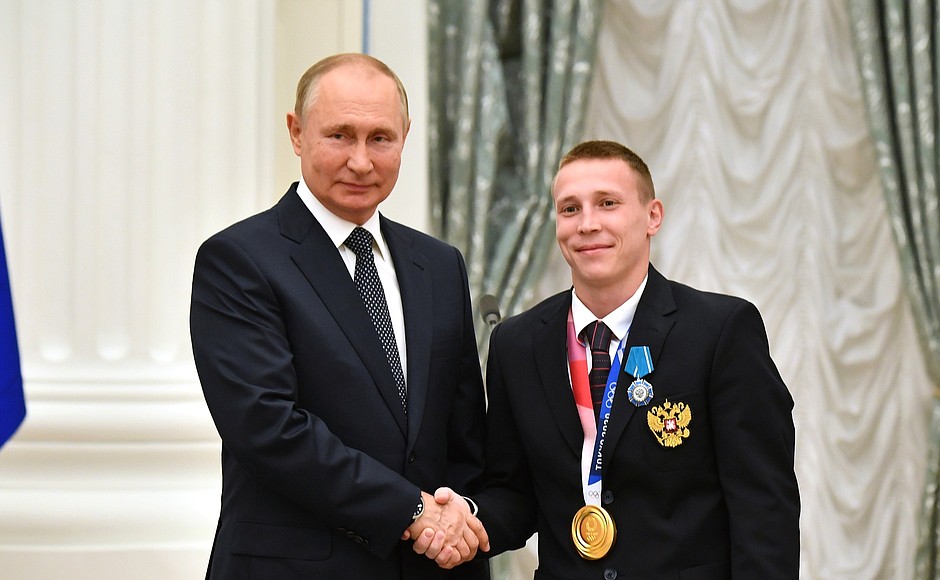 The ceremony for presenting state awards to the winners of the XXXII Olympics in Tokyo. Champion of the XXXII Olympics in the artistic gymanstics team event and silver medalist in vaulting Denis Ablyazin is presented with the Order of Honour.