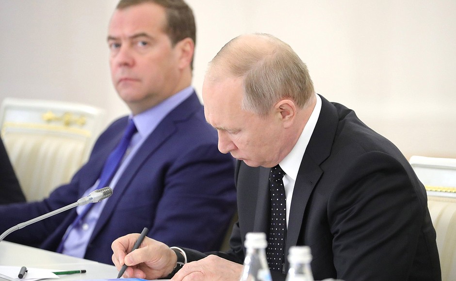 At the State Council meeting on the development of the national motorway system and ensuring road safety. On the left – Prime Minister Dmitry Medvedev.