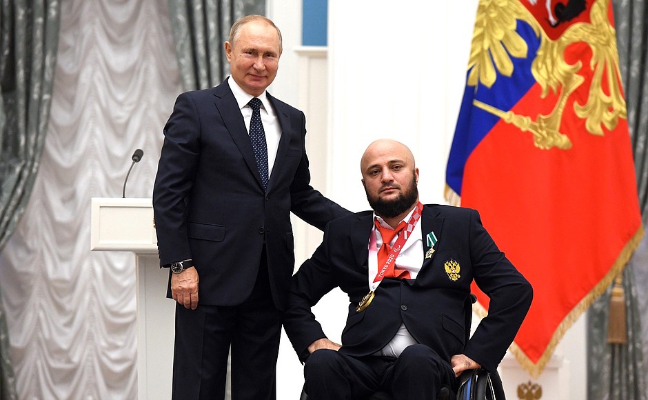 Presenting state decorations to winners of the 2020 Summer Paralympic Games in Tokyo. Paralympic athletics champion Musa Taymazov receives the Order of Friendship.