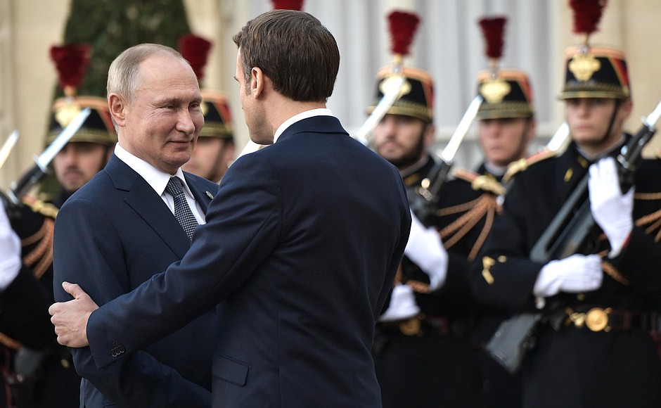 Vladimir Putin arrived at the Elysee Palace for the Normandy format summit. With President of France Emmanuel Macron.