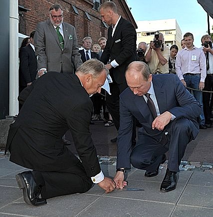 A personalised plate is laid for Vladimir Putin in Turku, Finland, in recognition of his efforts to protect the Baltic Sea.
