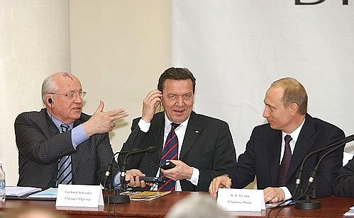 President Putin with German Federal Chancellor Gerhard Schroeder and Mikhail Gorbachev, Russian chairman of the Coordination Committee of the St Petersburg Dialogue forum, during the forum.