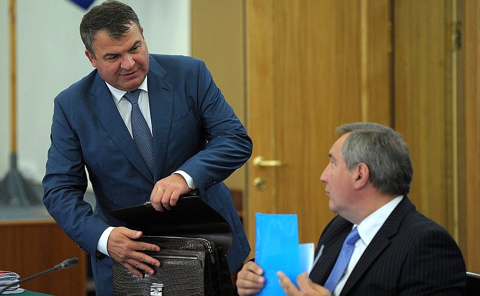 Defence Minister Anatoly Serdyukov (left) and Deputy Prime Minister and Chairman of the Government Military-Industrial Commission Dmitry Rogozin before the meeting on implementing state armament programme for the Navy.