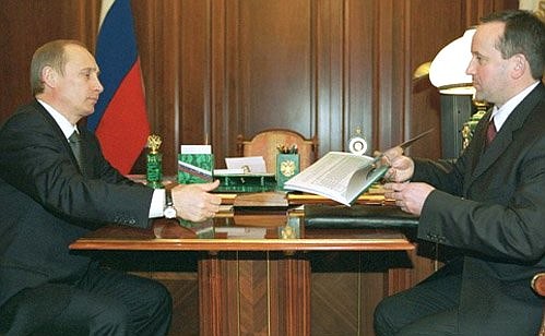С председателем правления Сбербанка Андреем Казьминым.