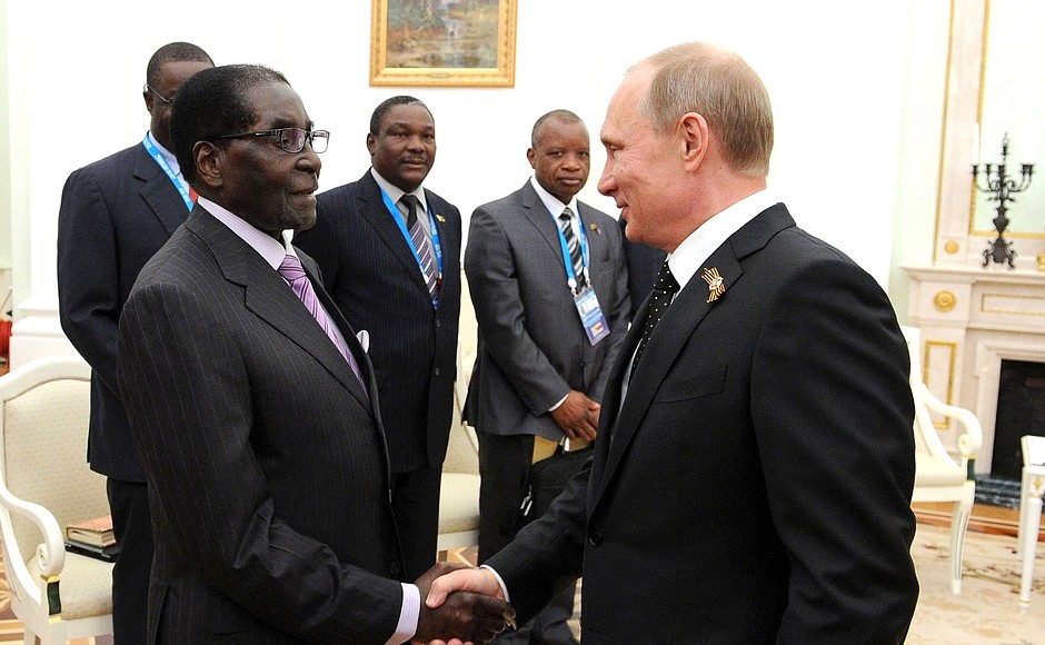 С Президентом Зимбабве, председателем Африканского союза Робертом Мугабе.