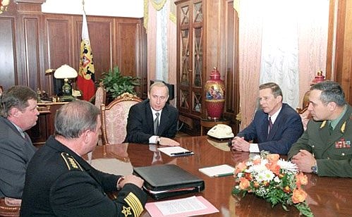Vladimir Putin with Prosecutor General Vladimir Ustinov (second left), Russia\'s Defence Minister Sergei Ivanov (second right), Chief of the General Staff Anatoly Kvashnin (right) and Commander-in-Chief of the Russian Navy Vladimir Kuroyedov (left).