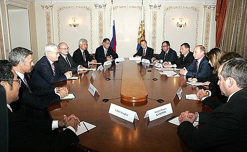 With the heads of foreign banks and companies.