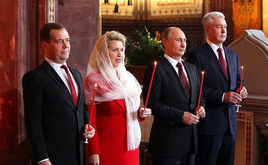 At an Easter service in the Cathedral of Christ the Saviour. With Prime Minister Dmitry Medvedev, his spouse Svetlana Medvedeva and Moscow Mayor Sergei Sobyanin.