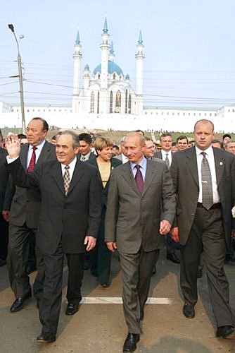 President Vladimir Putin and President of Tatarstan Mintimer Shaimiyev walking around the city.