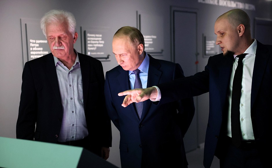 Touring the Peter the Great: Birth of the Empire multimedia exhibition in the Russia – My History historic park at VDNKh. Ivan Yesin, chair of the Russia – My History Association of Historic Parks, right, and Alexander Myasnikov, chief editor of the project, explain the exhibits.