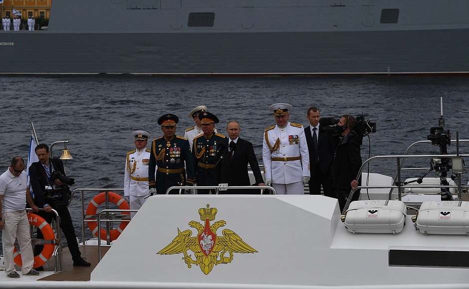 The Main Naval Parade. The President having made his rounds of the parade line of Russia’s military ships along the Neva River saluted the ships’ crews.