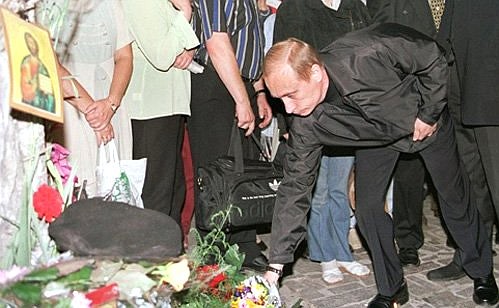 Laying flowers at the site of the pedestrian underpass explosion in Pushkin Square.