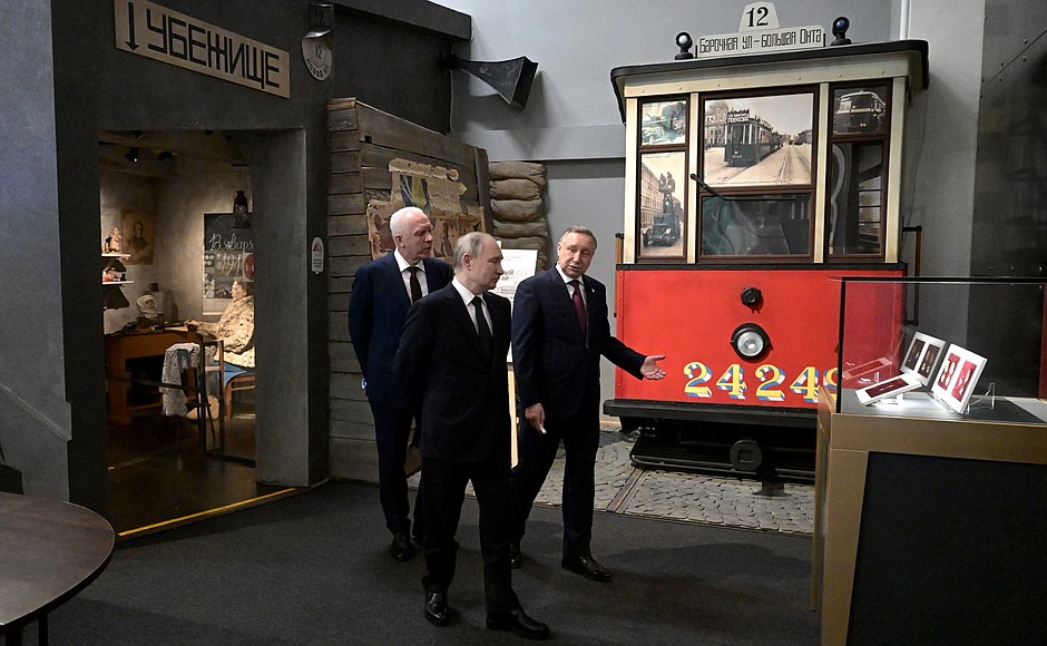 Touring the Spark of the Leningrad Victory exhibition at the State Memorial Museum of the Defence and Siege of Leningrad. With Presidential Plenipotentiary Envoy to the Northwestern Federal District Alexander Gutsan (left) and St Petersburg Governor Alexander Beglov.