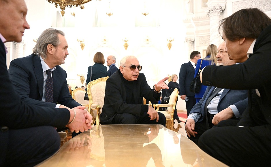 Chair of the Union of Artists of Russia, sculptor Andrei Kovalchuk, left, and General Director of the Mosfilm cinema concern Karen Shakhnazarov, centre, before a meeting with trusted representatives.