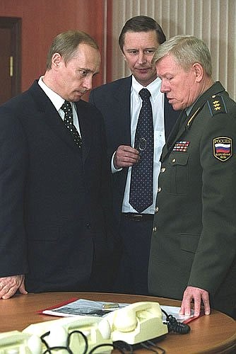 President Putin with Defence Minister Sergei Ivanov (centre) and Commander of the Space Forces Colonel-General Anatoly Perminov at the Space Forces headquarters.
