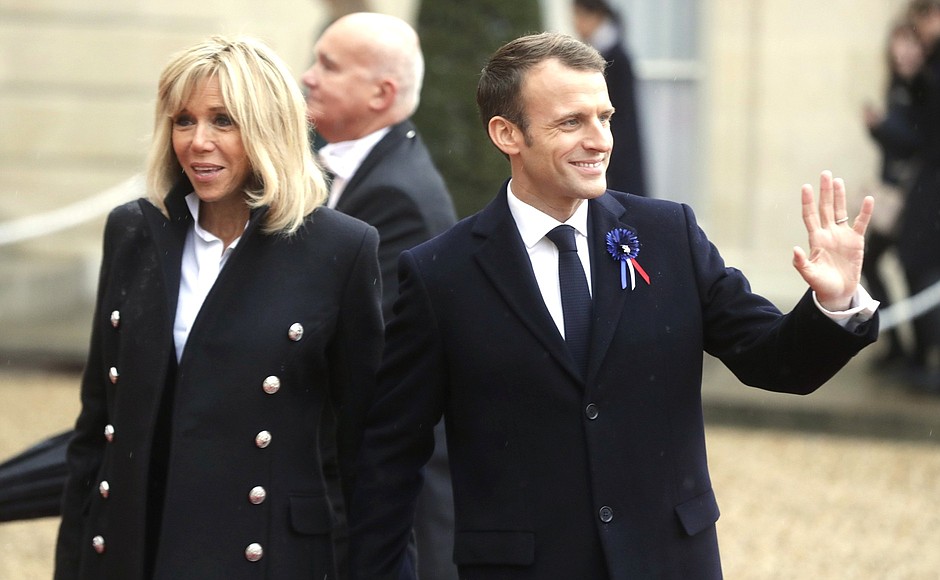President of the French Republic Emmanuel Macron with his wife Brigitte before the working breakfast at the Elysee Palace.