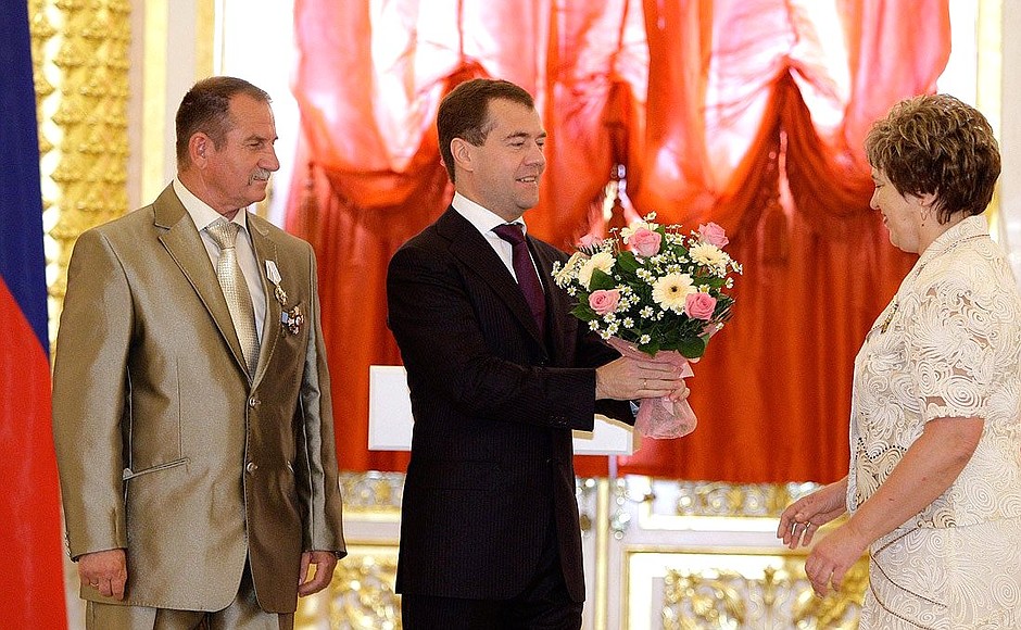 Nikolai and Lyudmila Nikolenko receiving the Order of Parental Glory.