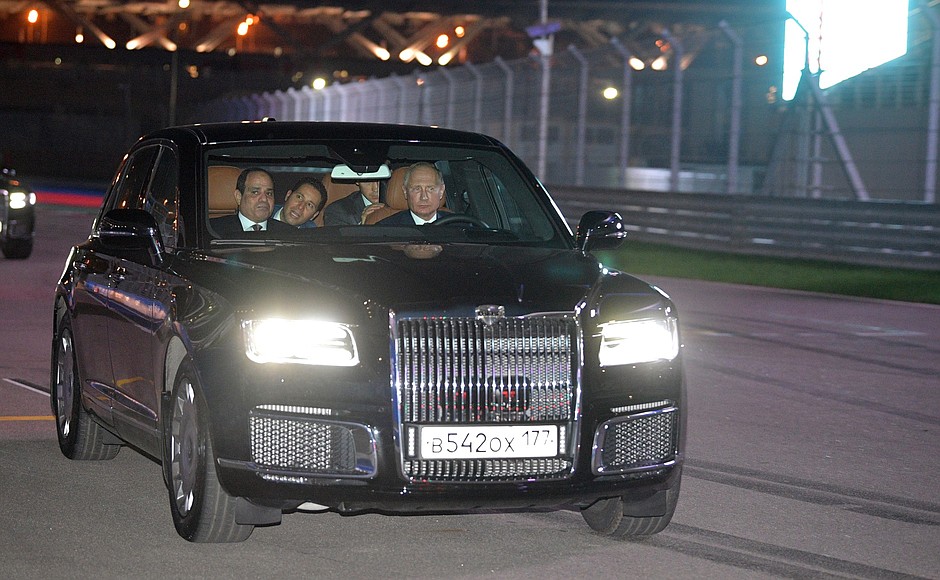 Vladimir Putin and President of Egypt Abdel Fattah el-Sisi took a ride on the Sochi Autodrom race track in the new Russian Aurus.