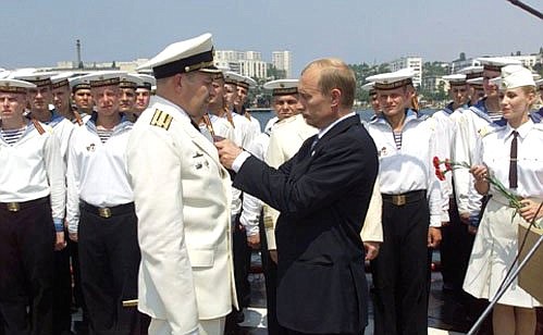 On board the Russian Black Sea Fleet\'s flagship, the Moskva missile cruiser. Presenting decorations to Black Sea navymen.