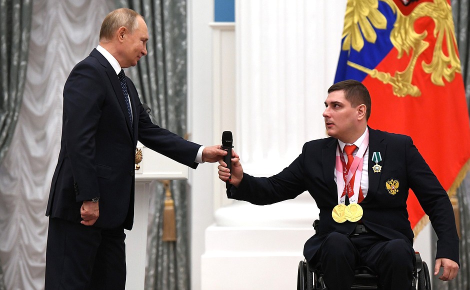 Presenting state decorations to winners of the 2020 Summer Paralympic Games in Tokyo. Two-time Paralympic champion in wheelchair fencing Alexander Kuzyukov receives the Order of Friendship.