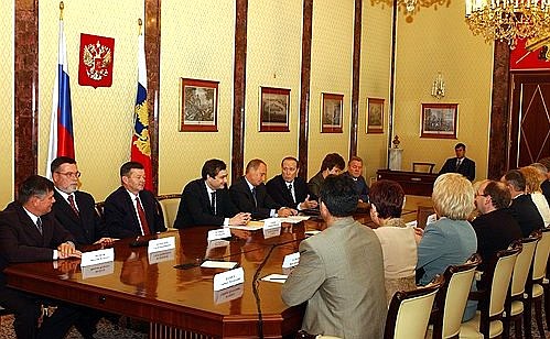 President Putin meeting with members of the Central Election Commission.
