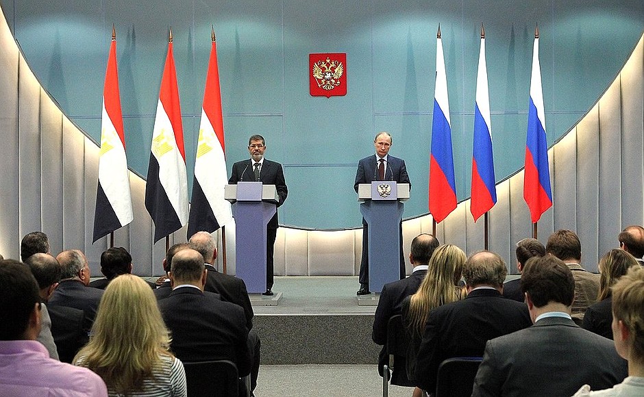 News conference following Russian-Egyptian talks. With President of Egypt Mohammed Morsi.
