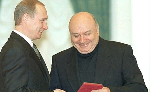 President Putin conferring the honorary title of the Honoured Art Worker of Russia on writer Mikhail Zhvanetsky at a decoration ceremony in the Kremlin.